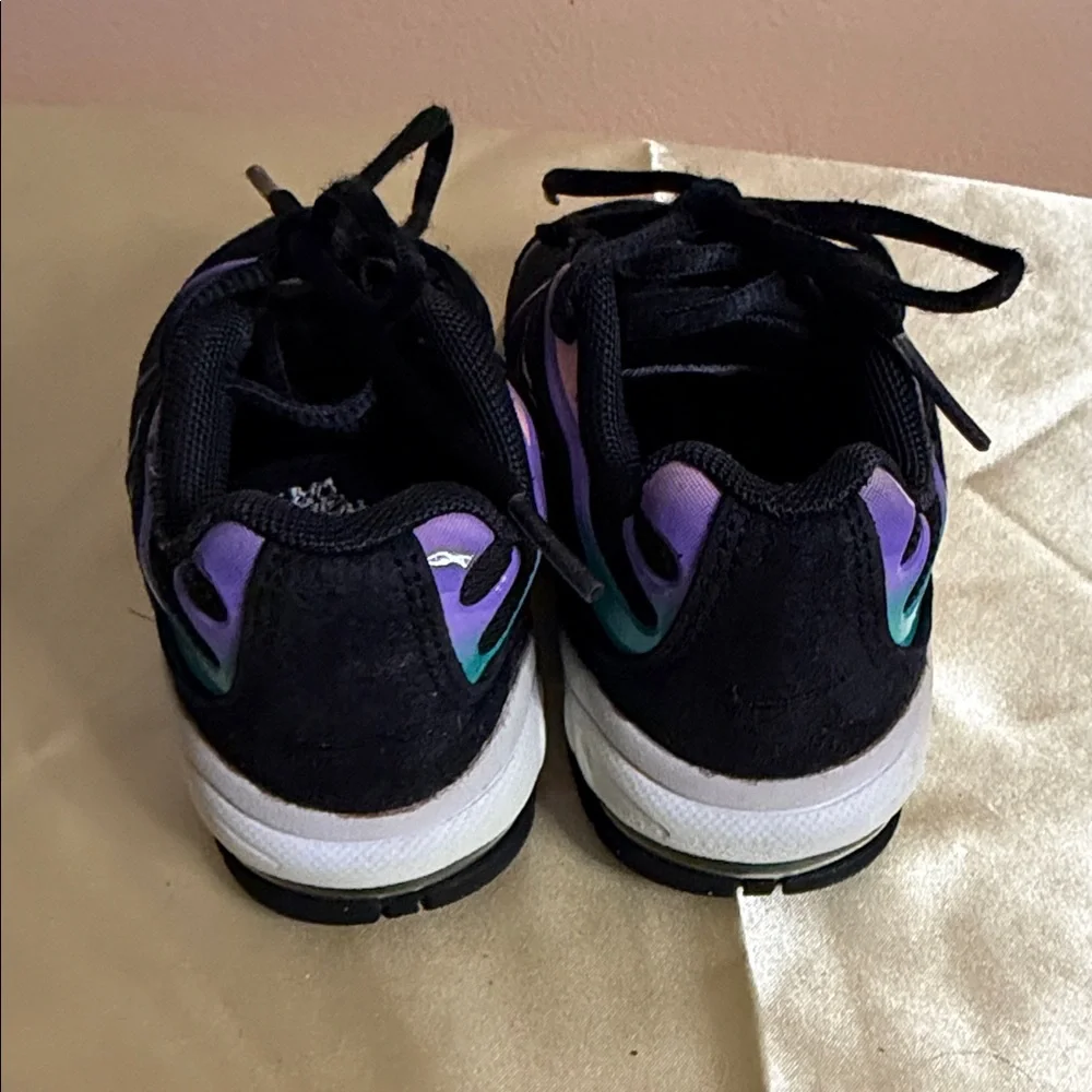 Nike Kids Black Sneakers with Iridescent Purple Accents